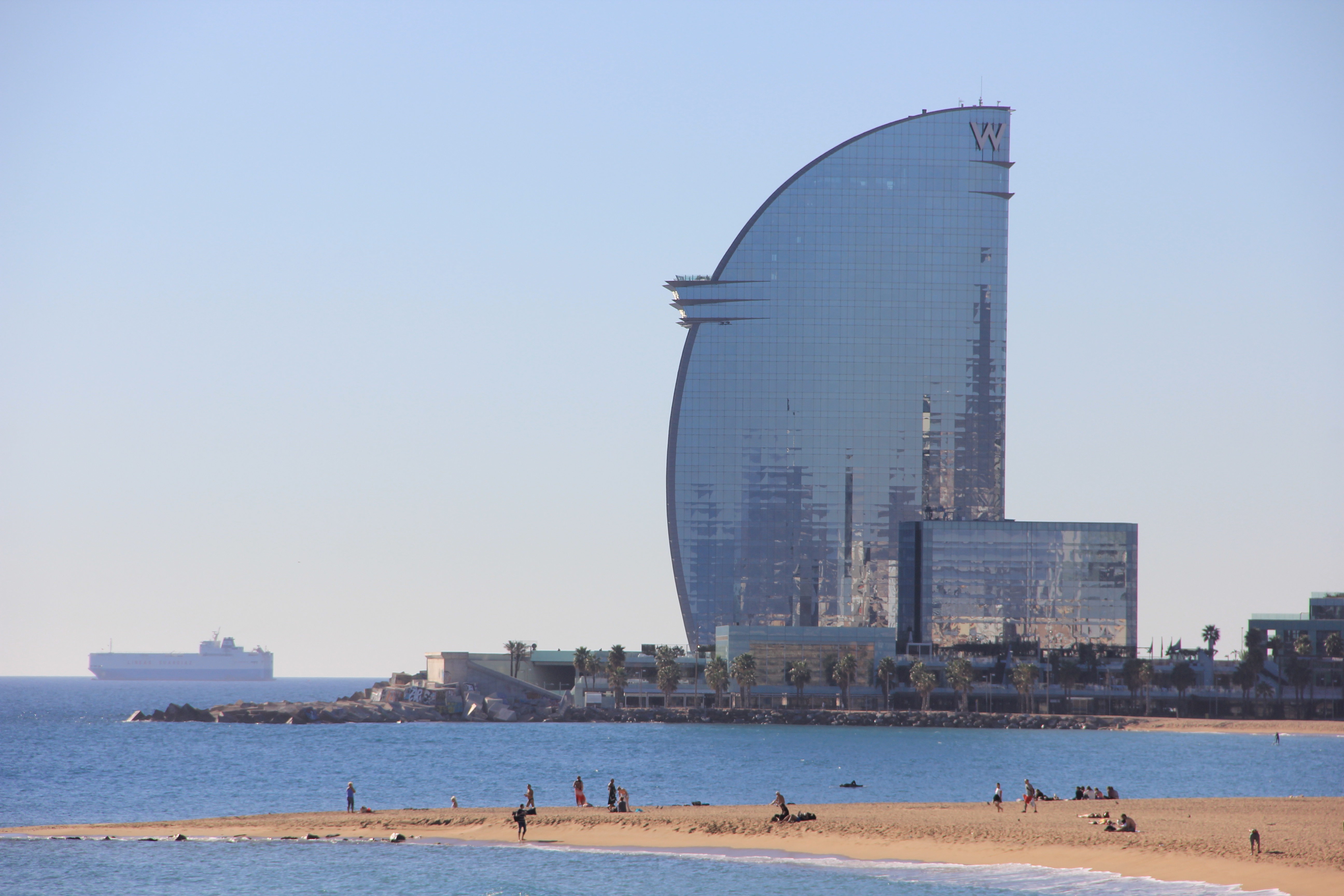 a large building on a beach